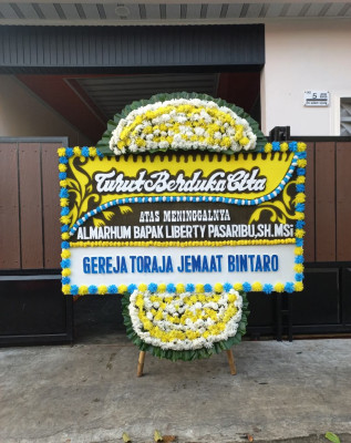 Papan Bunga Duka di Tatura Selatan